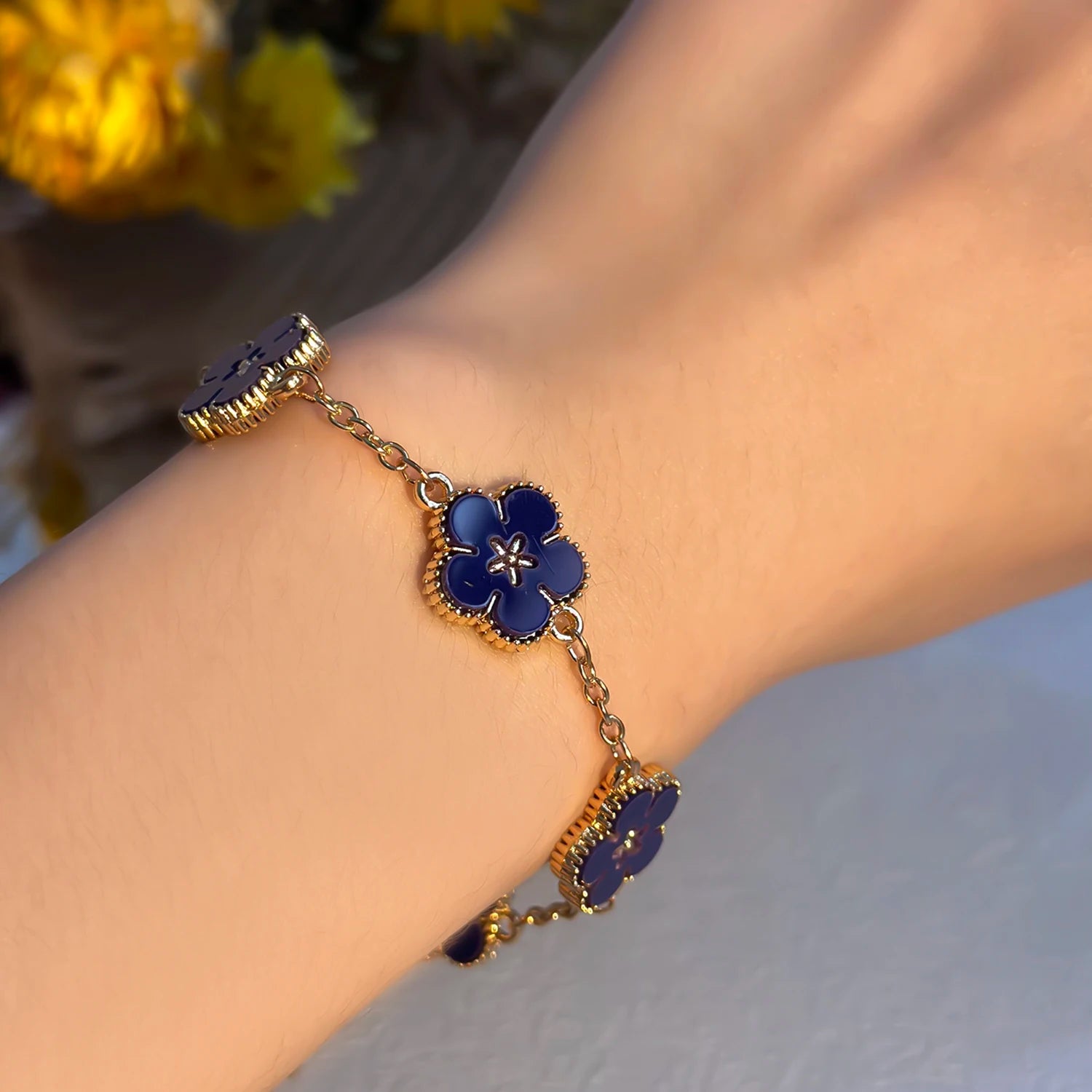 🌸 BloomCharm™ – Double-Sided Plum Blossom & Lucky Flower Bracelet