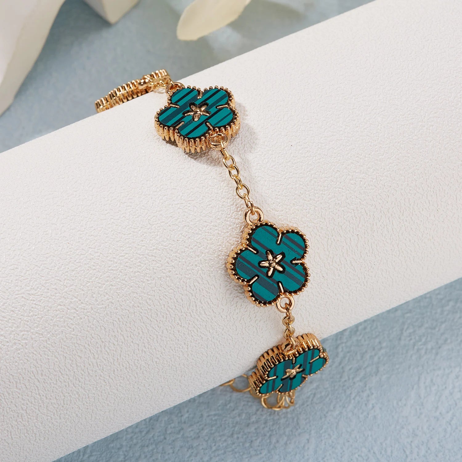 🌸 BloomCharm™ – Double-Sided Plum Blossom & Lucky Flower Bracelet