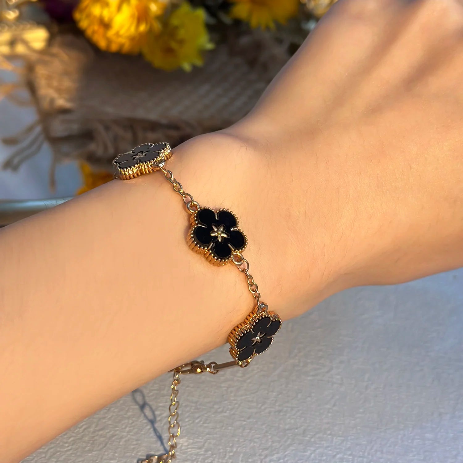 🌸 BloomCharm™ – Double-Sided Plum Blossom & Lucky Flower Bracelet
