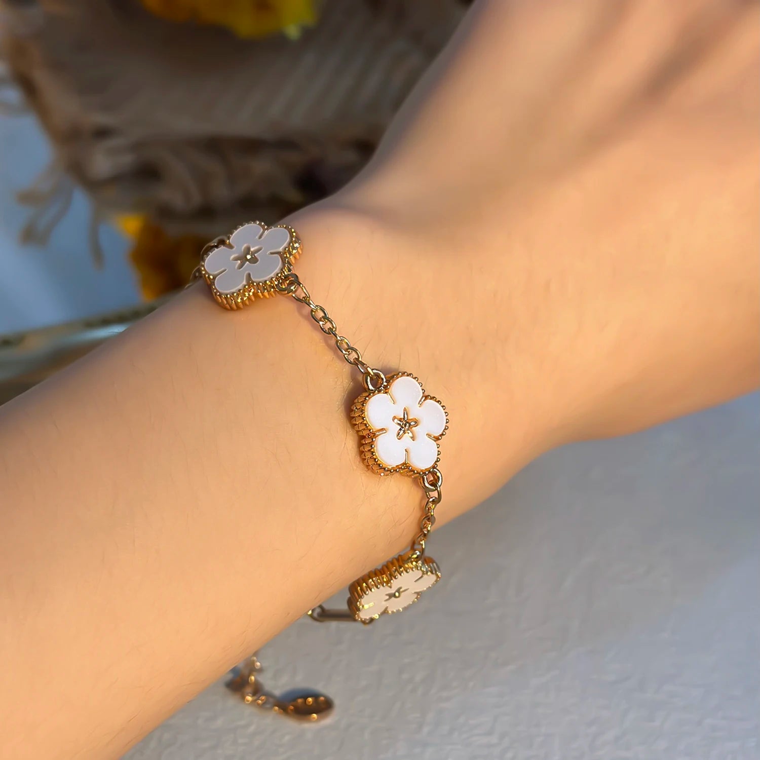 🌸 BloomCharm™ – Double-Sided Plum Blossom & Lucky Flower Bracelet